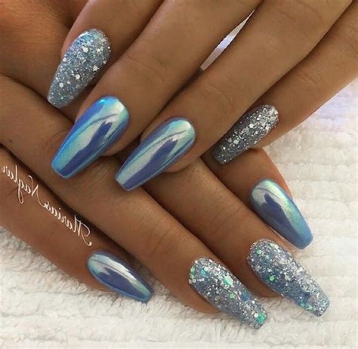 Blue glitter chrome nail design