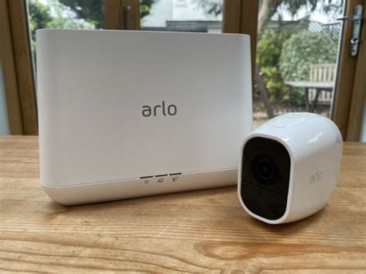Arlo Pro security camera attached to wall The Arlo Pro security camera attached to a wall.