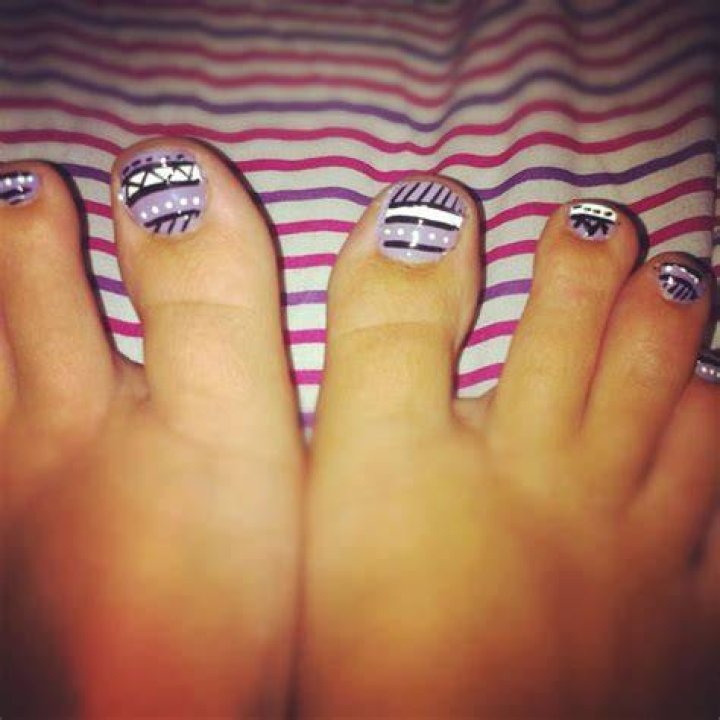 Tribal toe nail design.